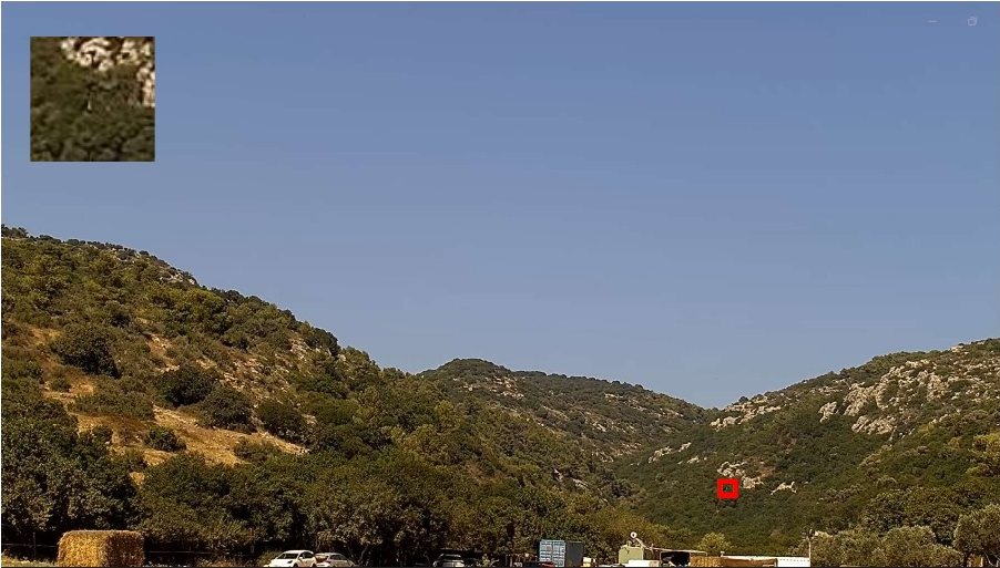Drone detection field test: Frame of a valley with a drone detected from the centre, marked by a red box and zoom inset