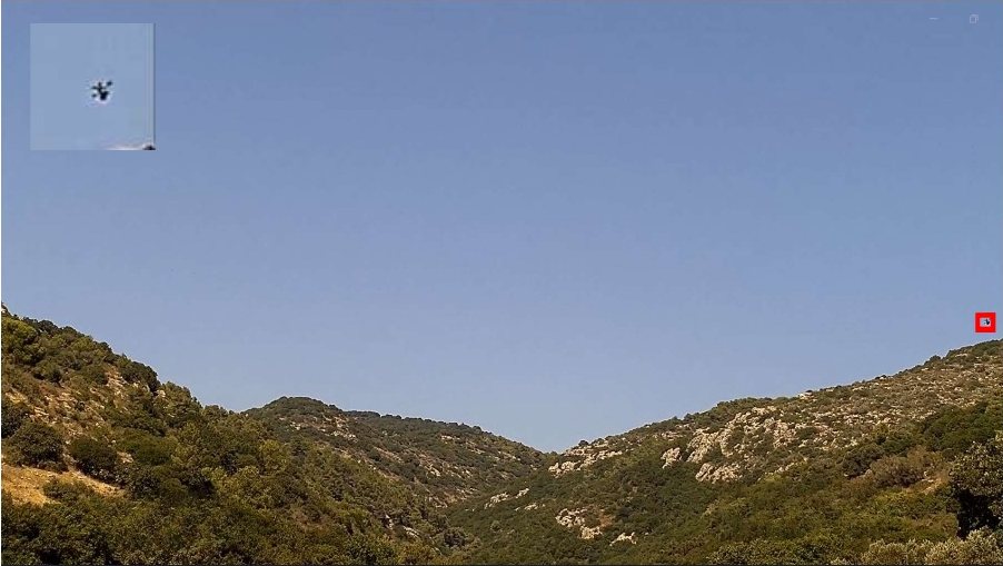 Drone detection field test: Frame of a valley with a drone detected from the north, marked by a red box and zoom inset