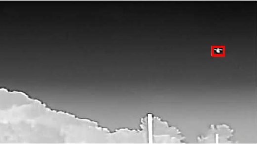 Drone detection field test: Fixed thermal channel frame with the drone marked by a red box