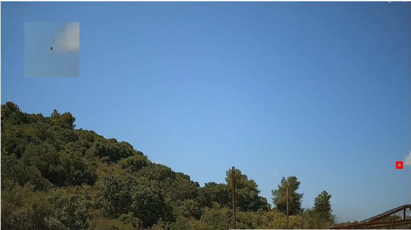 Drone detection field test: Day-channel frame showing a drone detected against the sky above a wooded hillside, marked with a red box, with a zoomed inset of the drone